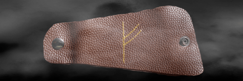 Omad tumori sifatida teriga Fehu rune